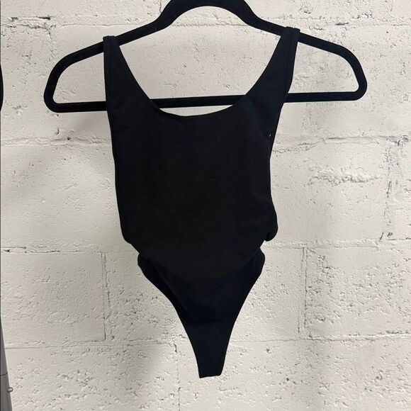 American Apparel Jet Black Bodysuit Thong NWOT - Size XS Open Back - NEW - Picture 1 of 3